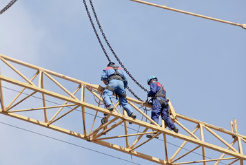 Wall Mural - Workers on the crane