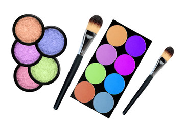 set of 5 eyeshadows and brushes isolated on white background