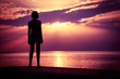 Silhouette of Young Woman Watching Sea Sunset