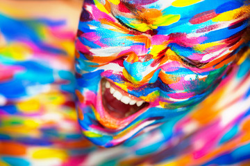 portrait of the bright beautiful girl with art colorful make-up