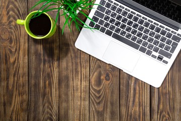 Canvas Print - Laptop. Office desk table with computer, supplies, coffee cup