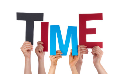 many people hands holding colorful word time