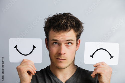 Fotografie, Obraz Portrait of a Person Holding Happy and Unhappy Mood Board