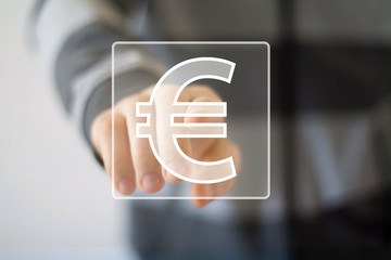 Businessman pushing button with eur icon