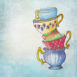 handpainted vintage cups on aqua color background