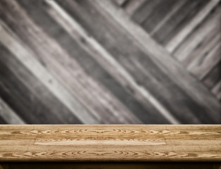 Poster - Empty wood table top with blur diagonal wood wall,Product displa