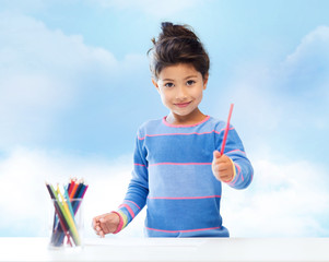 Poster - happy little girl drawing with coloring pencils