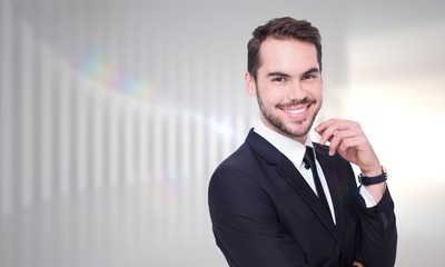 Poster - Composite image of stylish businessman smiling at camera