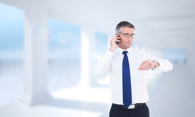Poster - Businessman on the phone looking at his watch