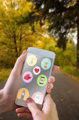 Poster - Composite image of hand holding smartphone