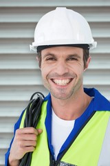 Poster - Composite image of happy electrician