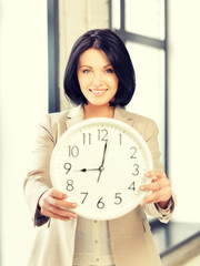 Canvas Print - businesswoman with clock