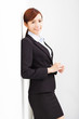 © Tom Wang - young businesswoman leaning against white wall in office
