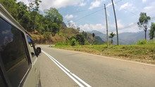 ELLA, SRI LANKA - MARCH 2014: Sri Lankan Tropical Landscape From Driving Minivan.
