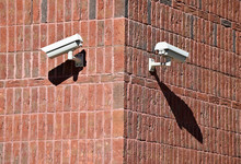 Security Cameras On The Wall Of An Office Building