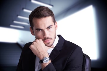 Poster - Composite image of cheerful businessman posing with hand on chin