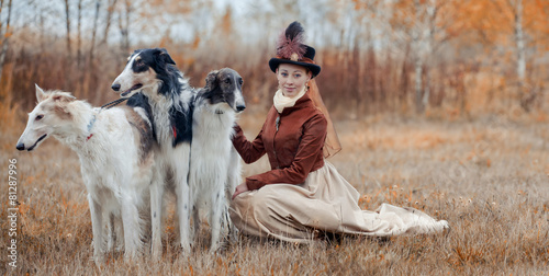 Foto Portrait of LadyXIX Century with russian borzoy dogs