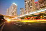 Fototapeta  - the light trails on the modern building background in shanghai china