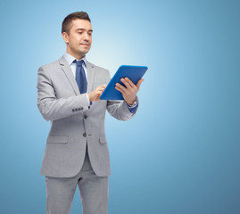 Sticker - happy businessman in suit holding tablet pc