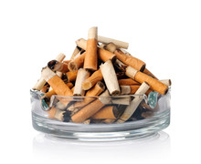 Cigarette Butts In The Ashtray On White
