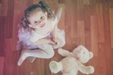 cute girl with her teddy bear