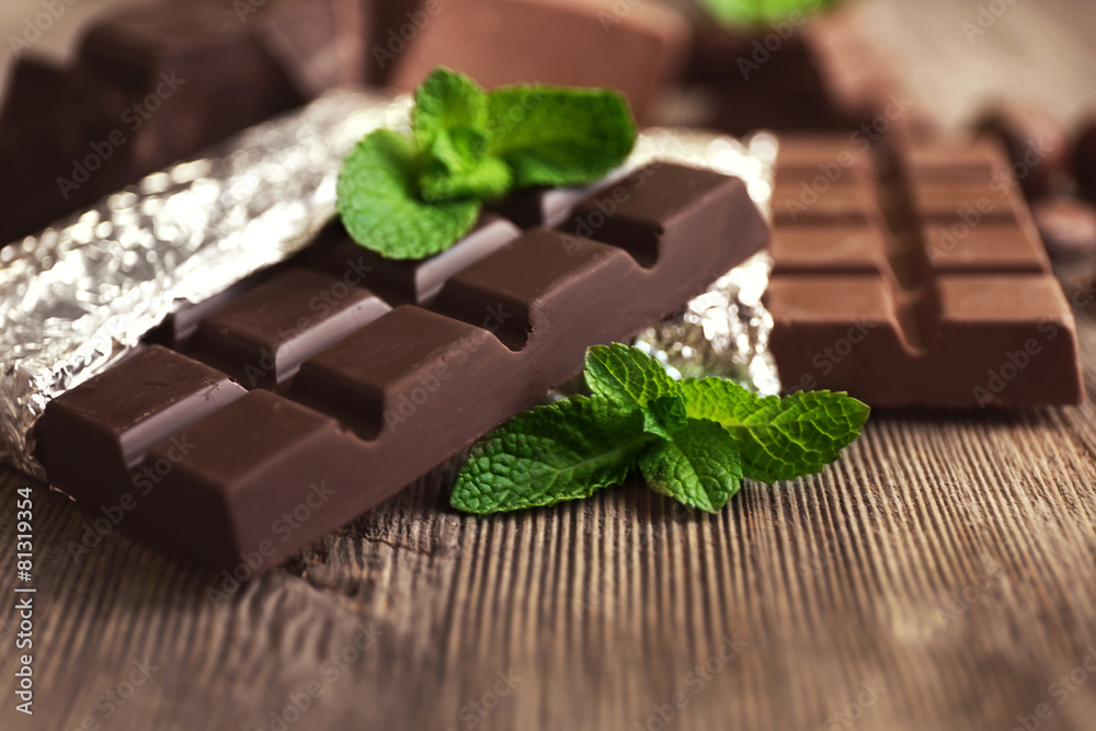 Set of spicy chocolate on wooden table, closeup