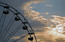 A Ferris Wheel At Dusk