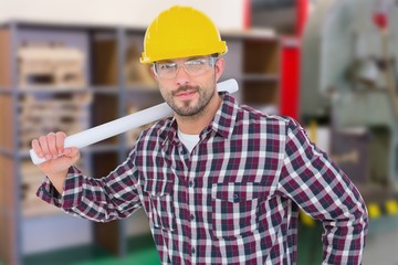Poster - Composite image of handyman holding rolled up blueprint