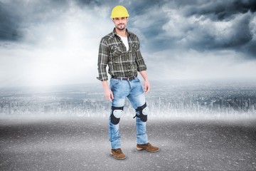 Poster - Composite image of full length portrait of confident handyman