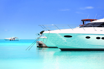 Yacht parked at jetty in Baros Maldives