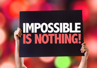 Wall Mural - Impossible is Nothing card with bokeh background