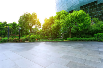 Empty road near modern building exterior