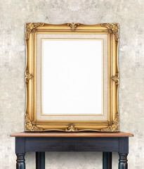 Leinwandbilder - Blank vintage golden photo frame lean at light color concrete wa