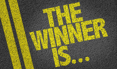Wall Mural - the winner is... written on the road