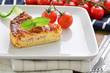 Home made ham and cheese quiche with tomatoes and cucumber