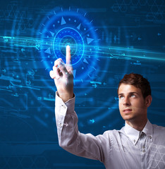 Poster - Handsome tech guy pressing high technology control panel screen