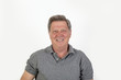 © travelview - smiling mature man with grey polo shirt