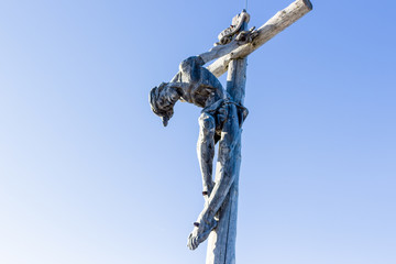 Wall Mural - the crucifixion of Jesus Christ on top of the dolomites alps