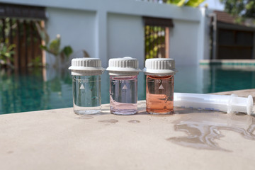 Closeup Water testing result on swimming pool edge