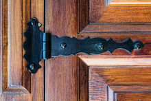 Hinge On An Old Wooden Door