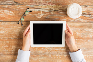 Canvas Print - close up of female hands with tablet pc and coffee