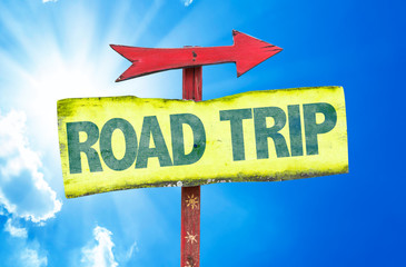 Wall Mural - Road Trip sign with sky background