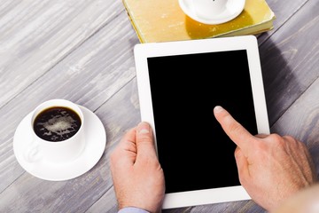 Wall Mural - Ipad. Digital tablet computer with isolated screen in male hands