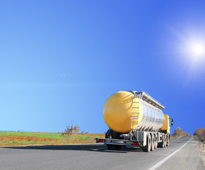 Canvas Print - Truck and highway at sunset