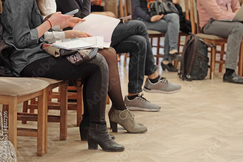 Fotomural The audience listens to the acting in a conference hall