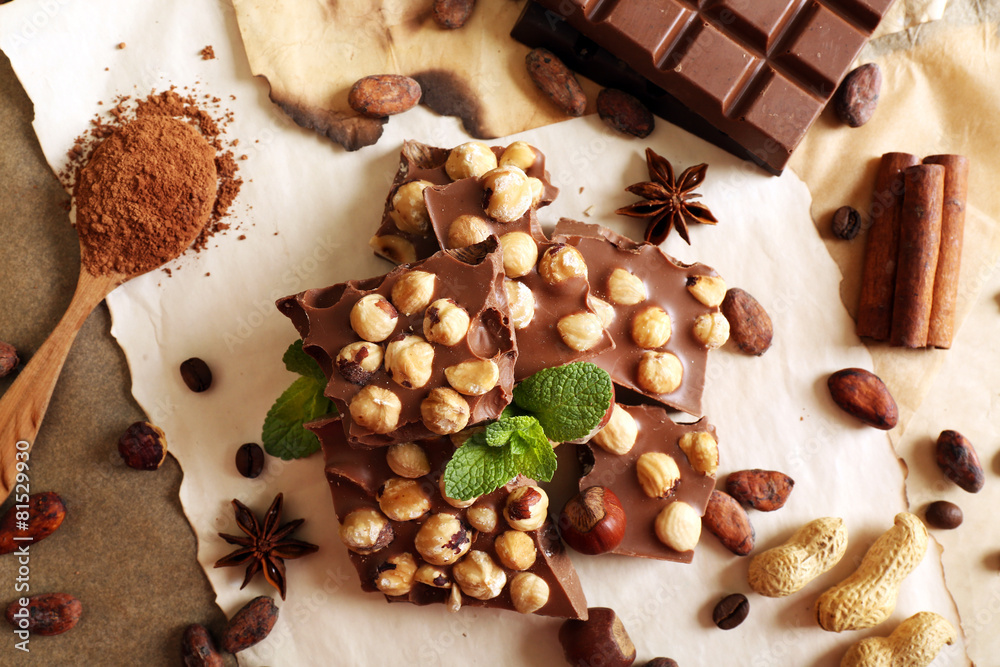 Still life with set of chocolate on table, top view