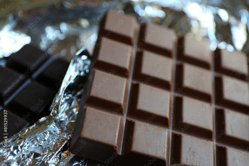 Set of chocolate on foil, closeup