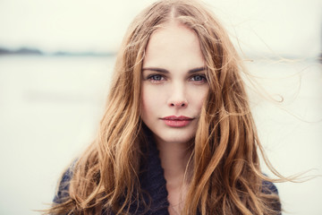 portrait of a beautiful girl on a cold windy day