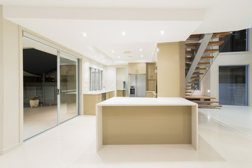 Modern white kitchen in new luxurious home