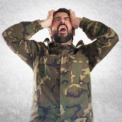 frustrated soldier over white background